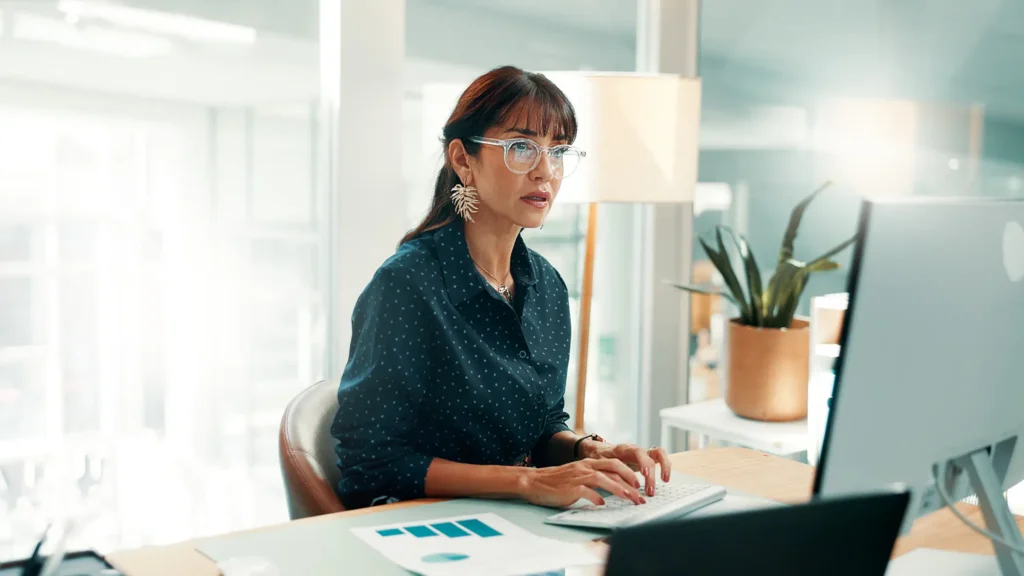 Business, finance and woman on computer for research, investment