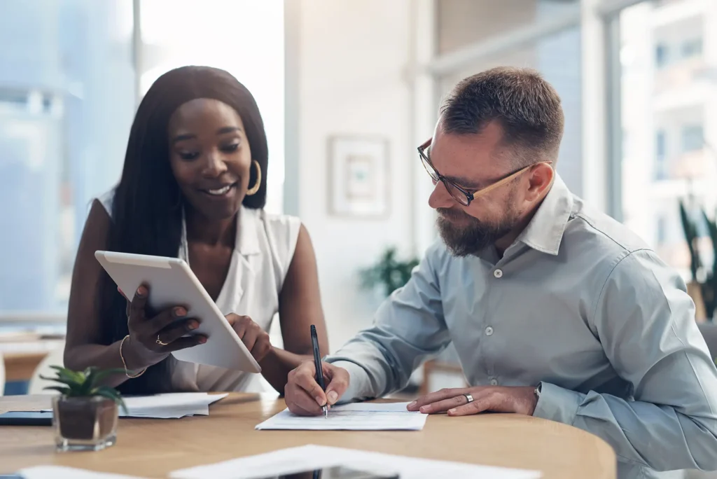 Reading, writing and people with tablet in startup, budget review